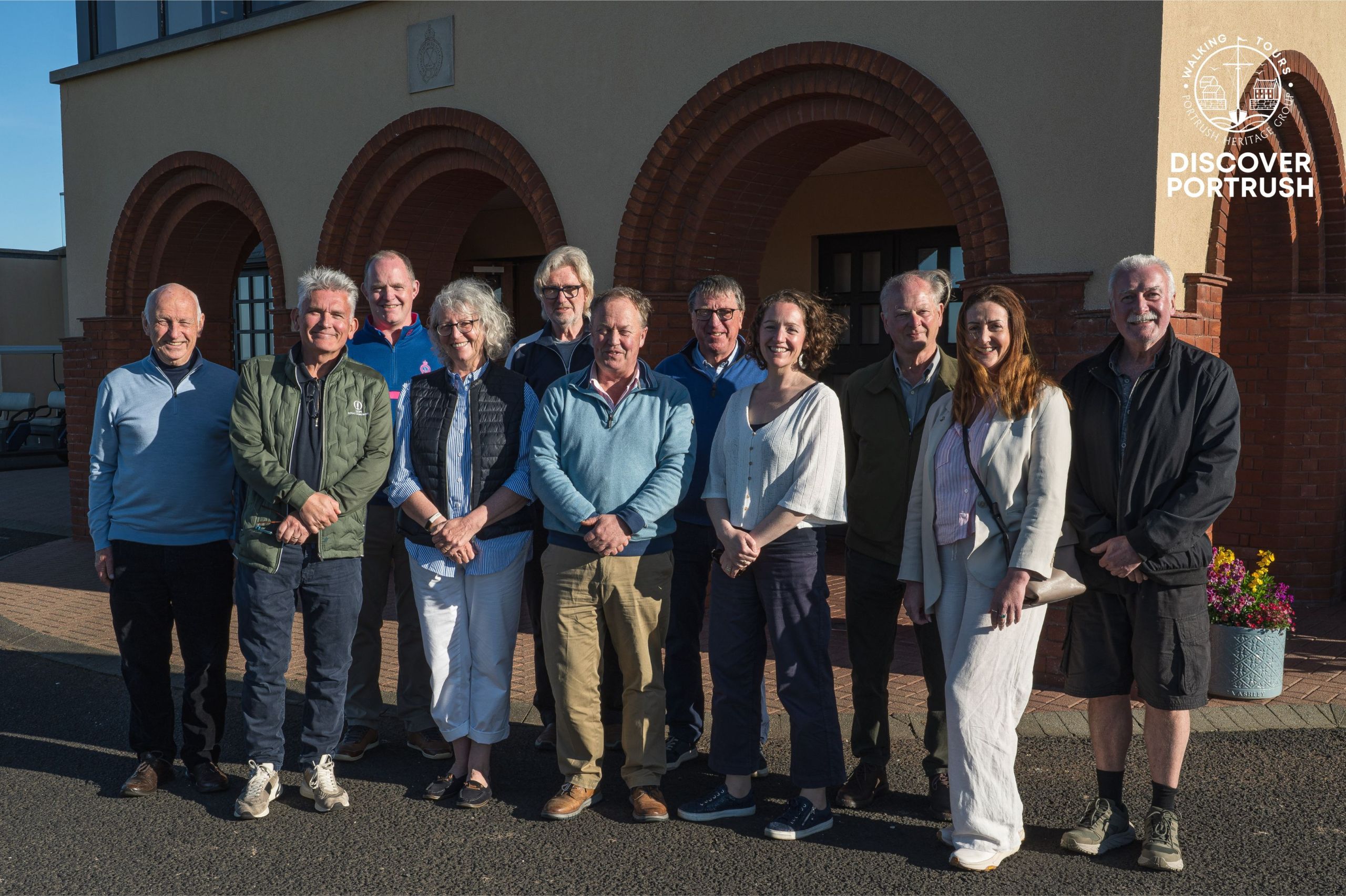 Photo of eleven Discover Portrush Tour Guides at Royal Portrush Golf Club